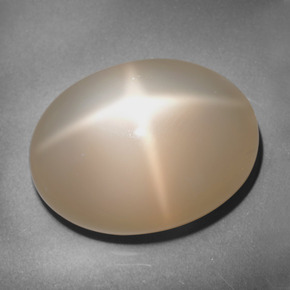 Pedra da lua estrela laranja natural 25,39ct, corte oval, translúcido