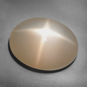 Pedra da lua estrela laranja natural 25,39ct, corte oval, translúcido