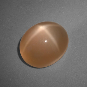 Pedra da lua estrela laranja natural 6,04ct, corte oval, translúcido