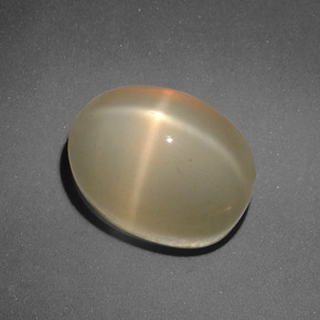 Pedra da lua estrela laranja natural 7,31ct, corte oval, translúcido