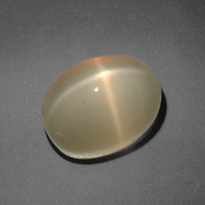 Pedra da lua estrela laranja natural 7,31ct, corte oval, translúcido