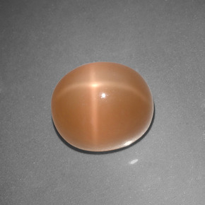 Pedra da lua estrela laranja natural 5,07ct, corte oval, translúcido