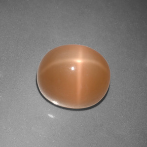 Pedra da lua estrela laranja natural 5,07ct, corte oval, translúcido