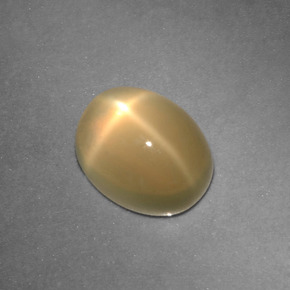 Pedra da lua estrela creme natural 2,73ct, corte oval, translúcido