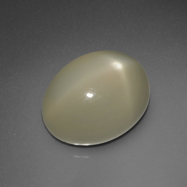 Pedra da lua estrela amarelo natural 7,34ct, corte oval, translúcido