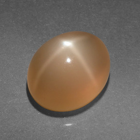 Pedra da lua estrela laranja natural 4,95ct, corte oval, translúcido
