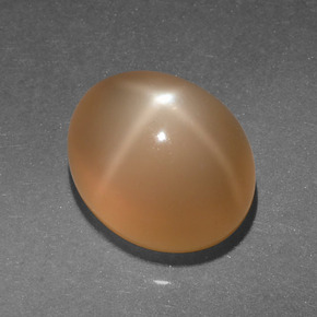 Pedra da lua estrela laranja natural 4,95ct, corte oval, translúcido