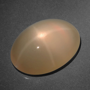 Pedra da lua estrela laranja natural 9,71ct, corte oval, translúcido