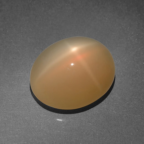 Pedra da lua estrela laranja natural 8,03ct, corte oval, translúcido