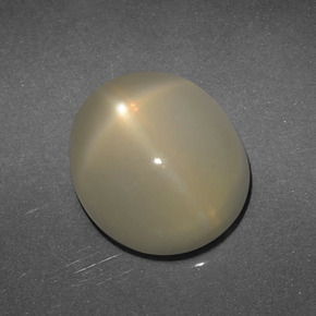 Pedra da lua estrela marrom natural 5,59ct, corte oval, translúcido