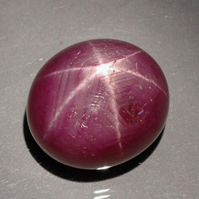 Rubi estrela vermelho natural 27,59ct, corte oval, opaco
