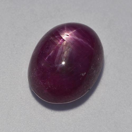 Rubi estrela roxo natural 8,32ct, corte oval, opaco