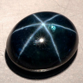 Safira estrela azul natural 11,53ct, corte oval, translúcido