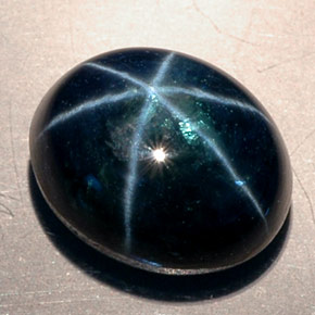 Safira estrela azul natural 11,53ct, corte oval, translúcido