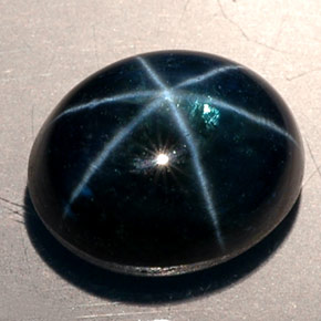 Safira estrela azul natural 11,53ct, corte oval, translúcido