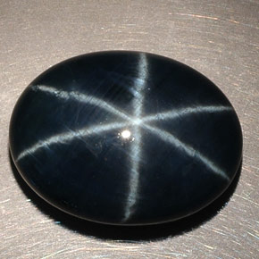 Safira estrela azul natural 14,60ct, corte oval, opaco