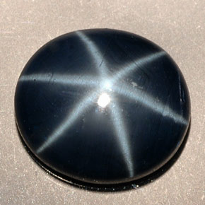 Safira estrela azul natural 5,38ct, corte oval, opaco