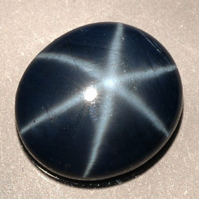 Safira estrela azul natural 5,38ct, corte oval, opaco