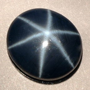 Safira estrela azul natural 5,38ct, corte oval, opaco