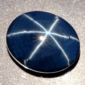 Safira estrela azul natural 16,41ct, corte oval, opaco