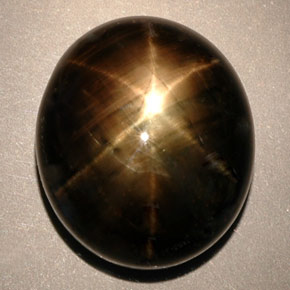 Safira estrela preto natural 24,91ct, corte oval, opaco
