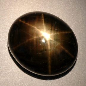 Safira estrela preto natural 24,91ct, corte oval, opaco