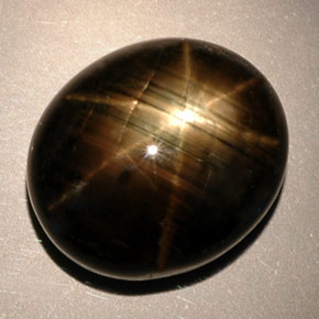 Safira estrela preto natural 24,91ct, corte oval, opaco