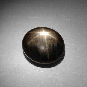 Safira estrela preto natural 33,41ct, corte oval, opaco