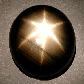 Safira estrela preto natural 55,93ct, corte oval, opaco