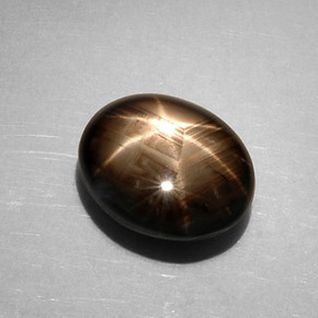 Safira estrela preto natural 7,59ct, corte oval, opaco