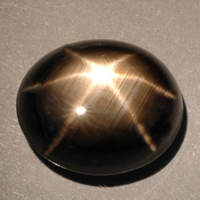 Safira estrela preto natural 10,00ct, corte oval, opaco