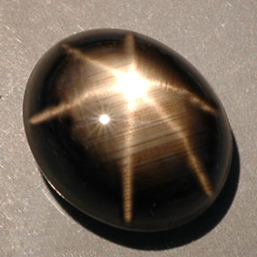 Safira estrela preto natural 10,00ct, corte oval, opaco