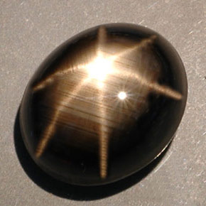 Safira estrela preto natural 10,00ct, corte oval, opaco