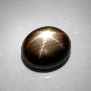 Safira estrela preto natural 11,17ct, corte oval, opaco