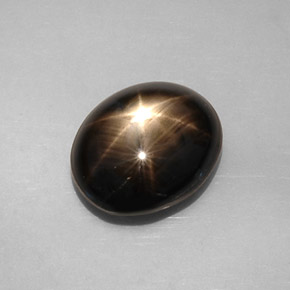 Safira estrela preto natural 8,19ct, corte oval, opaco