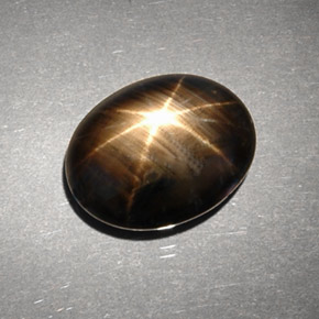 Safira estrela preto natural 6,63ct, corte oval, opaco