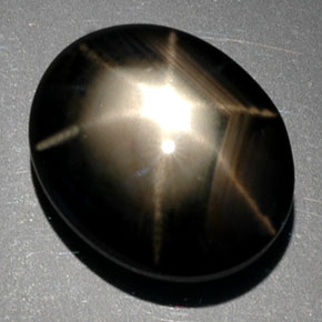 Safira estrela preto natural 9,39ct, corte oval, opaco