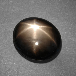 Safira estrela preto natural 13,78ct, corte oval, opaco