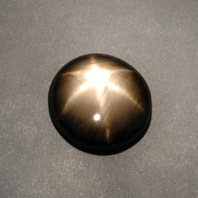 Safira estrela preto natural 12,04ct, corte oval, opaco