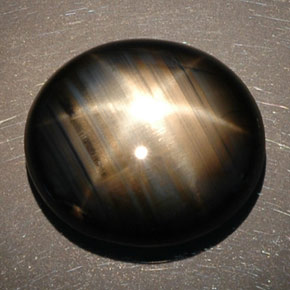 Safira estrela preto natural 16,89ct, corte oval, opaco