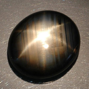 Safira estrela preto natural 16,89ct, corte oval, opaco