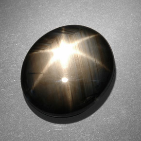 Safira estrela preto natural 13,06ct, corte oval, opaco
