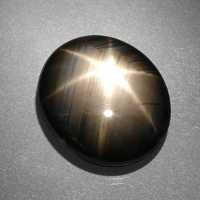 Safira estrela preto natural 13,06ct, corte oval, opaco