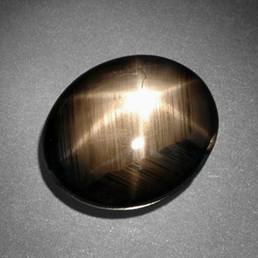 Safira estrela preto natural 10,78ct, corte oval, opaco