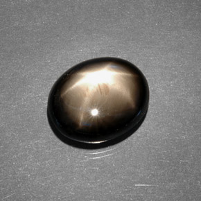 Safira estrela preto natural 7,88ct, corte oval, opaco