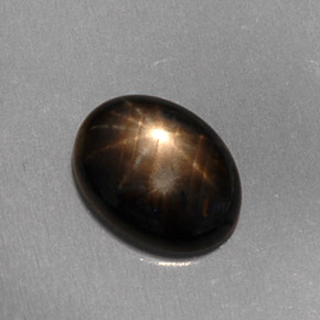 Safira estrela preto natural 1,59ct, corte oval, translúcido