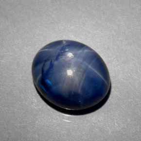Safira estrela azul natural 5,38ct, corte oval, opaco