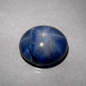 Safira estrela azul natural 5,38ct, corte oval, opaco