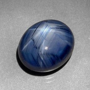 Safira estrela azul natural 7,29ct, corte oval, opaco