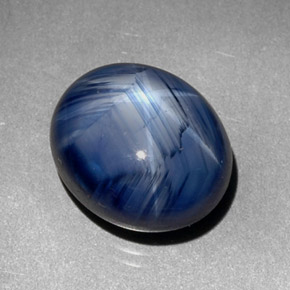 Safira estrela azul natural 7,29ct, corte oval, opaco